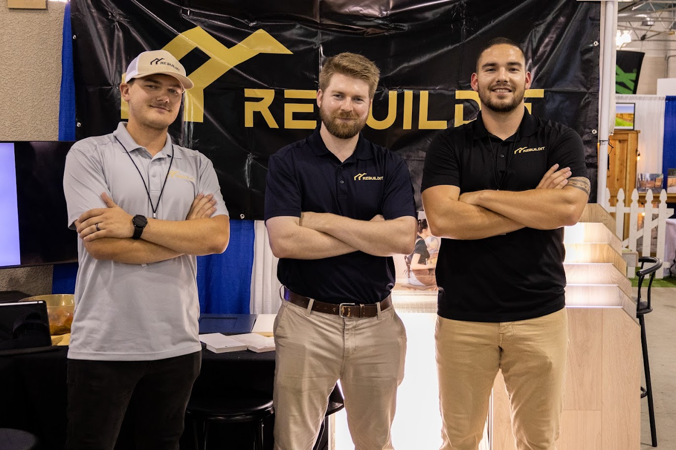 Rebuildit team members at a trade event